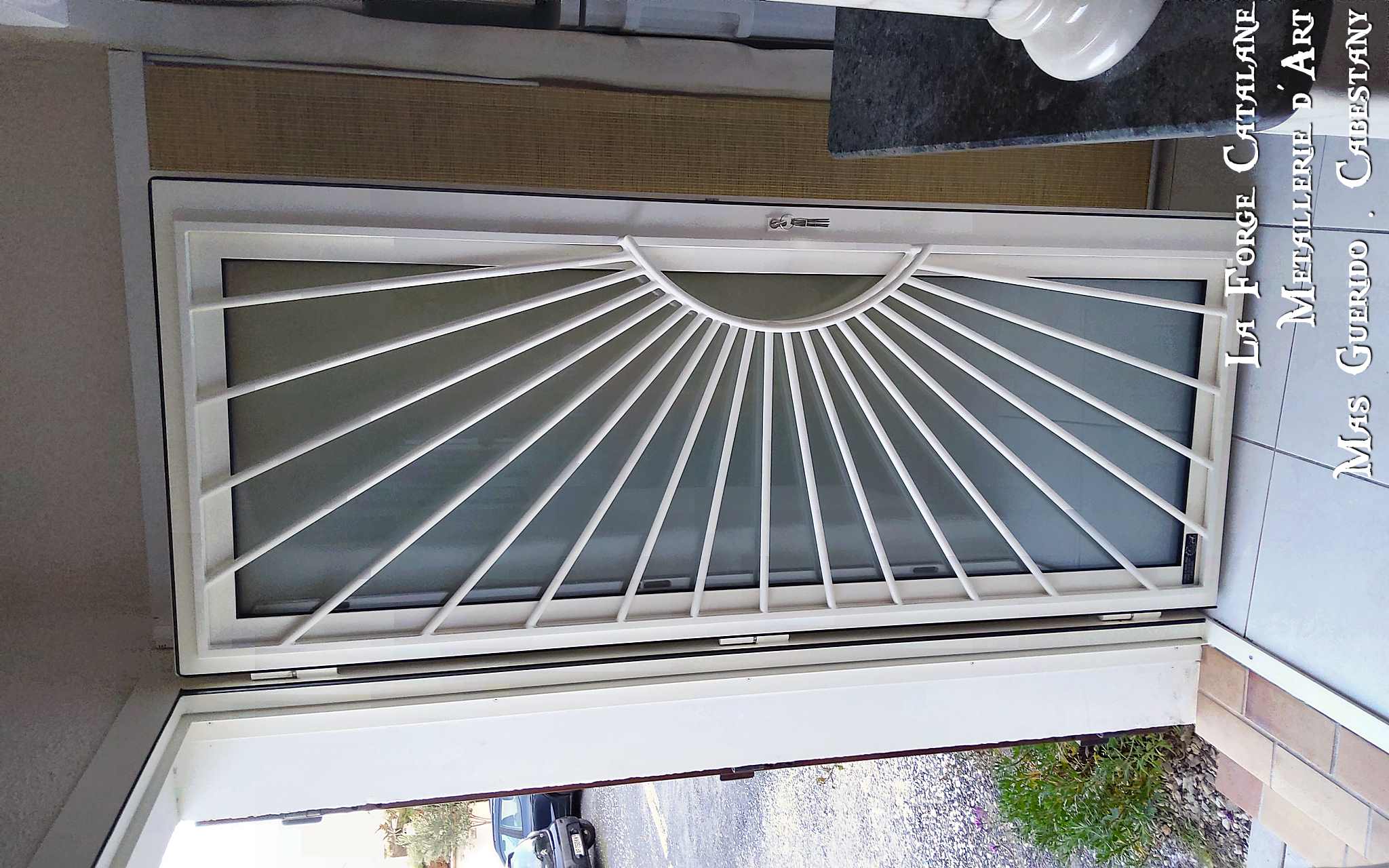 porte entree grille applique soleil thermolaquage forge catalane.jpg